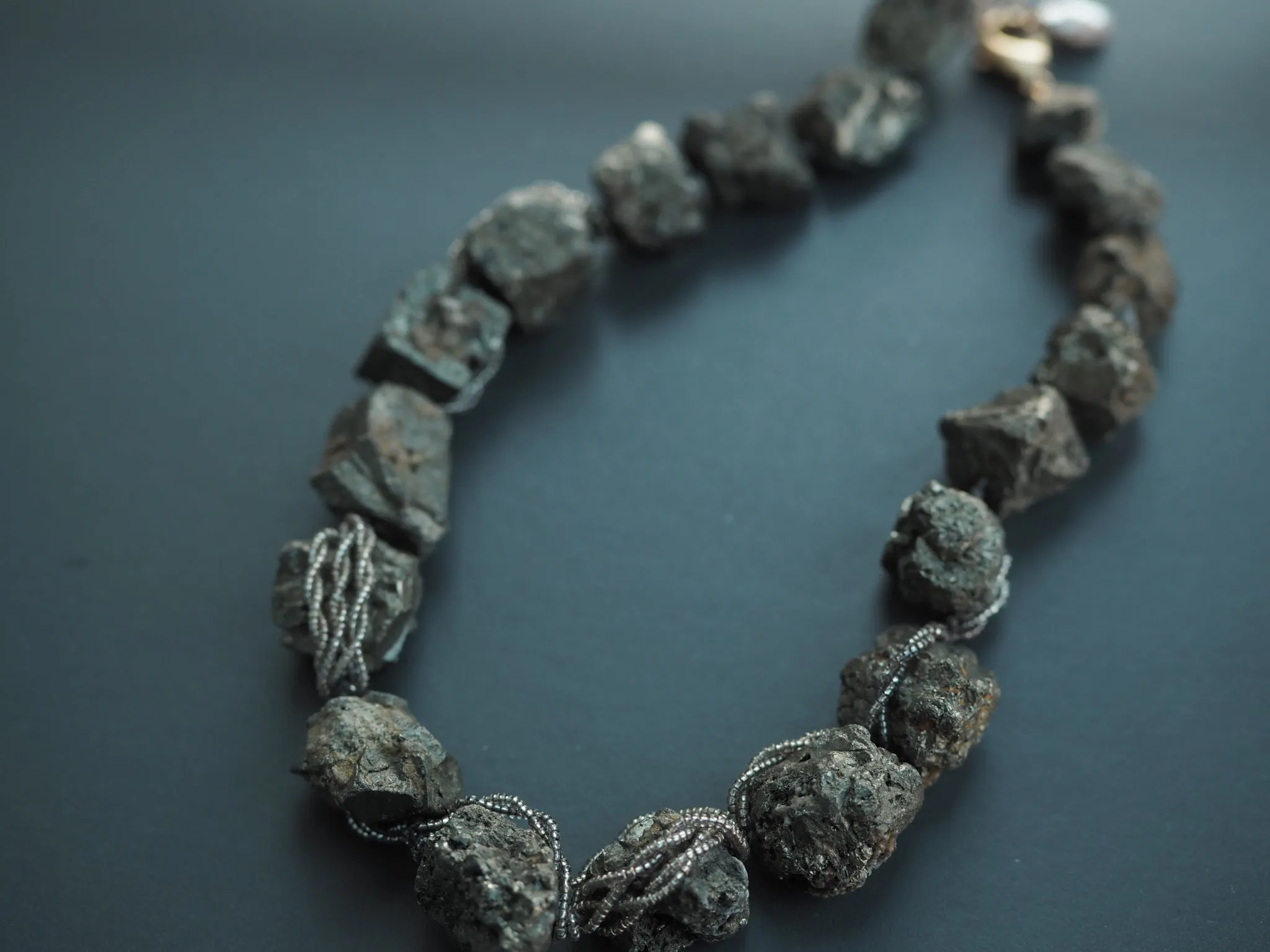 Raw pyrite crystal wrapped necklace