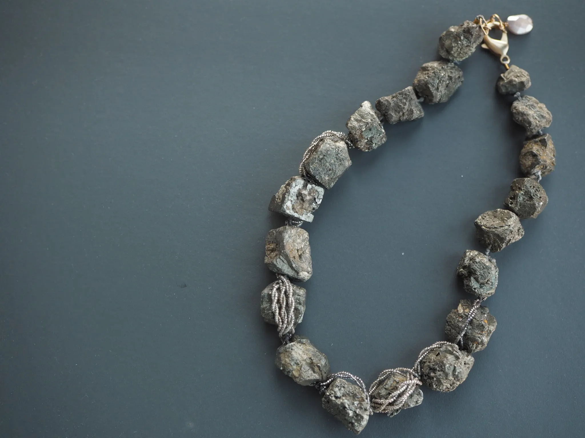 Raw pyrite crystal wrapped necklace