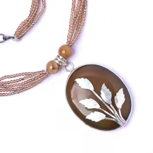 Silver Pendant in Onyx With Smoky Eye Beads Necklace