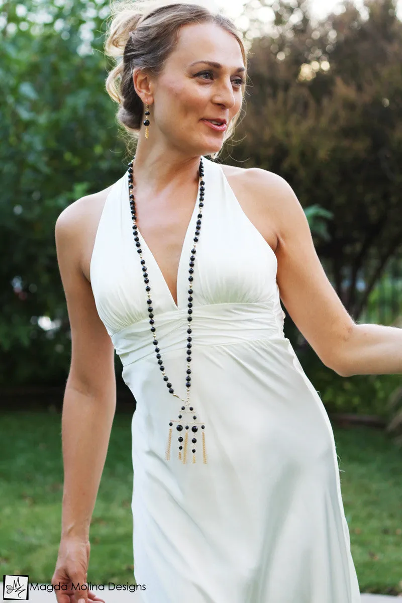 The Black Onyx And Gold Tassel Earrings